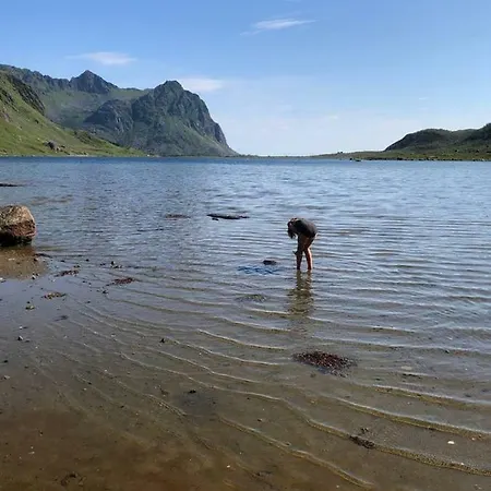 Seafront House In Fjord In The Middle Of Lofoten